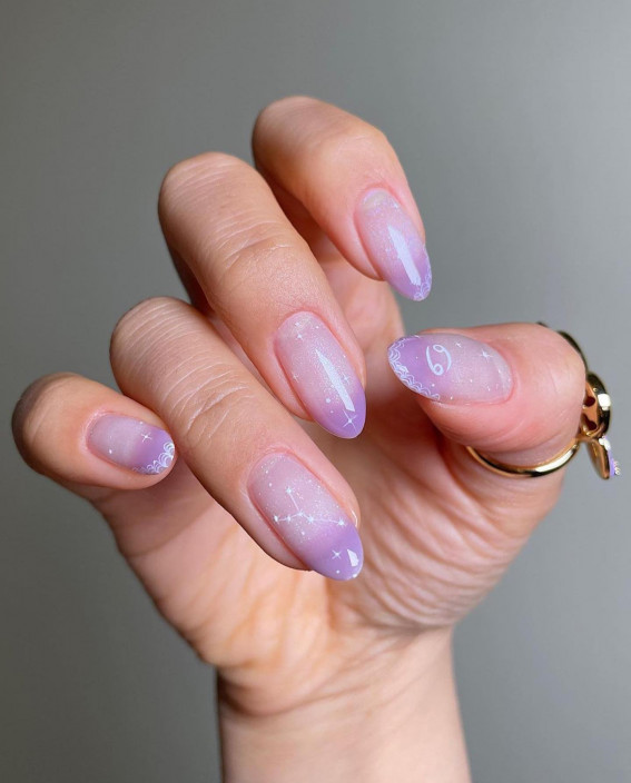 A gradient of pastel pink to lavender nail art