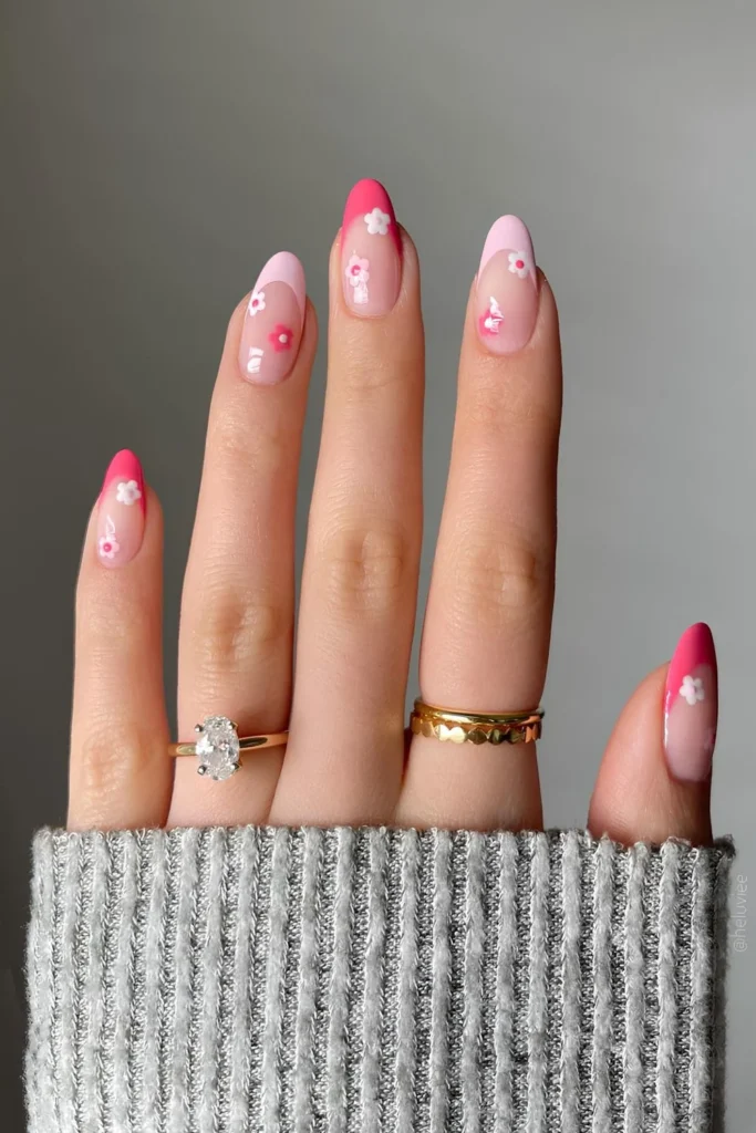 Soft pink nails with tiny hand-painted white daisies