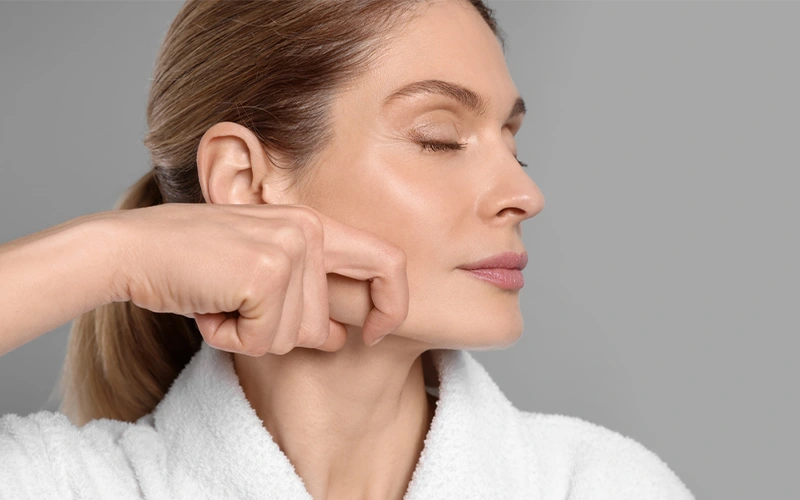 Tapping yoga face